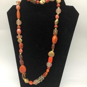 Photo of Vintage long orange necklace