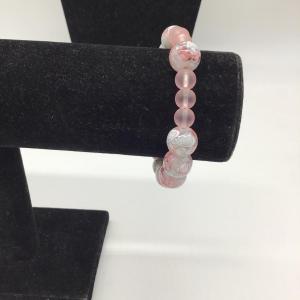 Photo of Gray,pink, and white designed bracelet