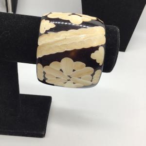 Photo of Wooden toned brown and creme fashionable bracelet