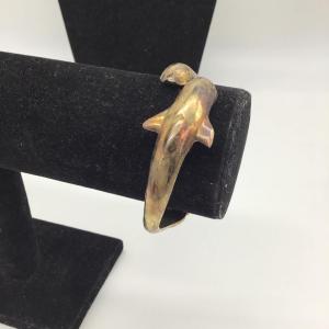 Photo of Gold toned dolphin bracelet