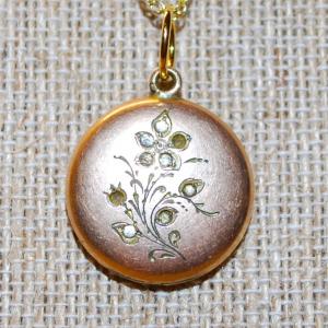 Photo of Vintage Flower Engraved Locket ¾" Diam. on a Gold Tone Necklace Chain 18" L