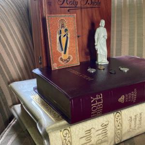 Photo of LOT 372: Vintage Religious Collection - Bibles, Medals and Small Statue