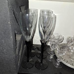 Photo of 6 black stem champagne glasses