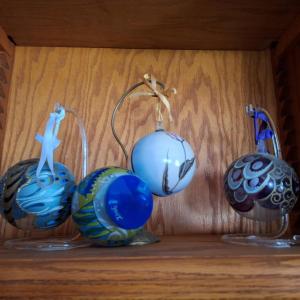 Photo of 4 hand painted ornaments