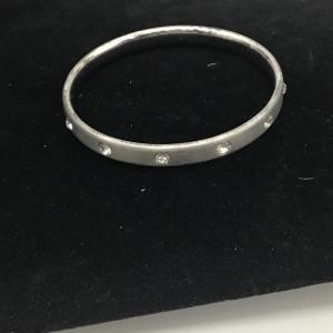 Photo of Studded metallic bangle bracelet