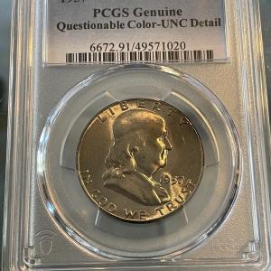 Photo of PCGS Certified 1957-P Uncirculated/FBL Superbly Toned Franklin Silver Half Dolla