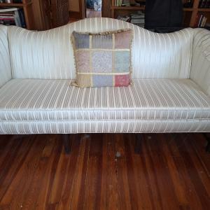 Photo of white striped couch