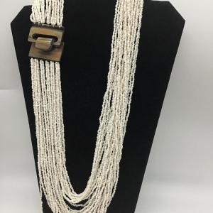 Photo of Multi strand Glass seed necklace. Beautiful. Wood style Latching Hook