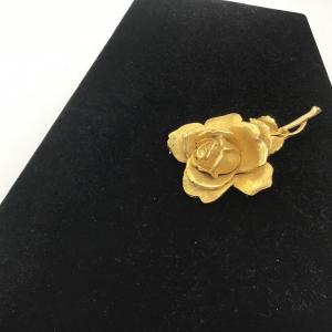 Photo of Gold toned rose brooch