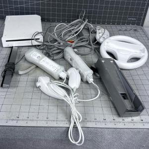 Photo of Wii Controller with Paddles and Cords