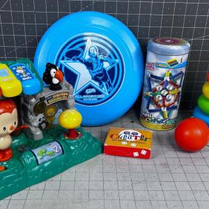 Photo of Grouping of Toys, Magnets, Frisbee and Stacking etc.  