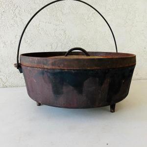 Photo of 14 Footed Cast Iron Pot With Coal Lid