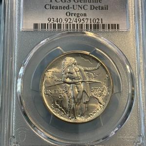 Photo of PCGS Certified Oregon Train 1926 Uncirculated/Cleaned Blast White Commemorative 