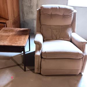 Photo of Fabric recliner with wooden midcentury modern drawered end table MCM gold accent