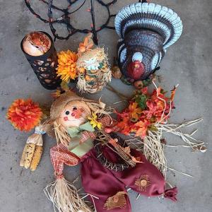 Photo of Fall Decorations - large ceramic Turkey and light up Pumpkin wish scarecrows and