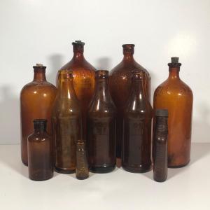 Photo of LOT 267: Vintage Brown Glass Bleach Bottles & More