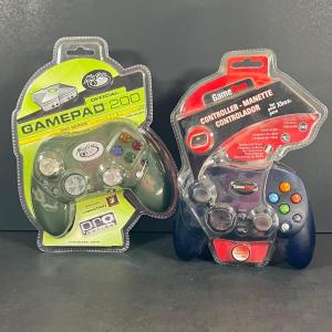 Photo of LOT 244: Two New in Package XBox Controllers