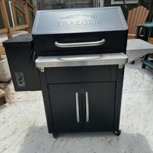 Photo of Nice Traeger Grill with side pellet hopper - and cover