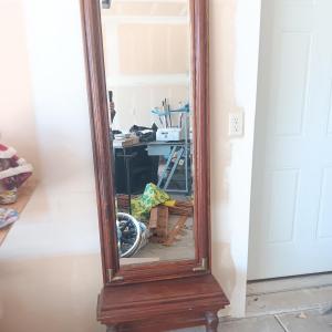 Photo of Wooden pier mirror with beveled glass and gold corner accents
