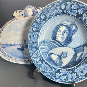 Photo of LOT 147: Two Large Pieces of Delft Porcelain - Scenic Wall Plaque and Jester Bow