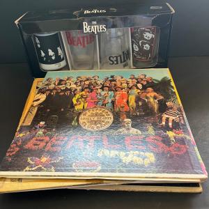 Photo of LOT 143: The Beatles Vintage Vinyl Record Albums and Collectible Pint Glass Set