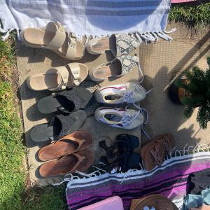 Photo of Yard sale w/ lots of clothes!