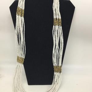 Photo of Beautiful White Glass seed bead with Gold Accent throughout. Pretty