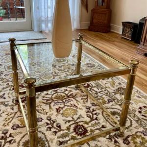 Photo of Gold tubed and glass top table