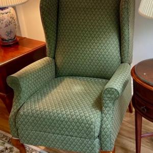 Photo of Green diamond pattern wing back reclining chair