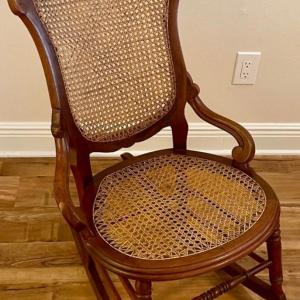 Photo of Carved and caned rocking chair