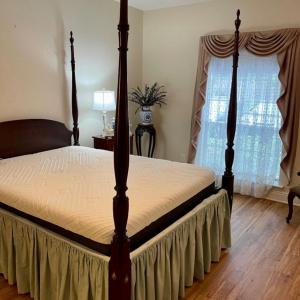 Photo of Queen Anne 4 post queen size bed with mattress and box spring