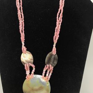Photo of Opera Shell Pink Glass Bead Necklace.
