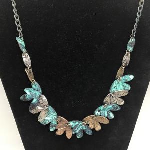 Photo of Turquoise and brass, silver toned leaf necklace