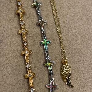 Photo of 2 Cross bracelets and angel wing necklace