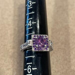 Photo of Sparkling purple stone ring