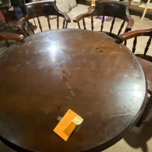 Photo of Vintage Round Game Table with Four Captains Chairs