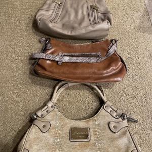 Photo of 3 beige handbags