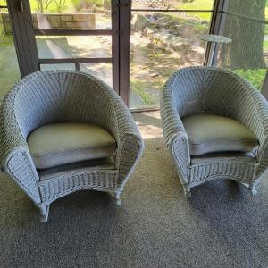 Photo of Pair of white wicker rocking outdoor chairs