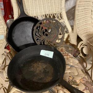 Photo of Lot of Cast Iron Panns and Trivet