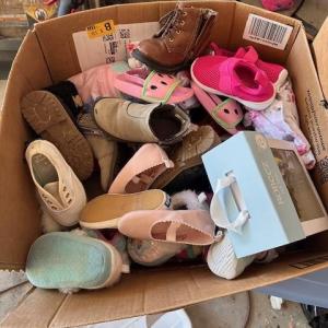 Photo of Garage Sale with lots of baby items