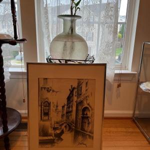 Photo of Framed Artwork w/ Plant and Stand