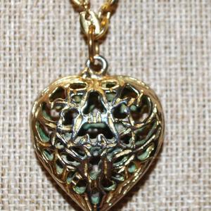 Photo of Closed Gold Tone Heart Shaped Locket PENDANT (1¼" X 1¼") on a Long Necklace Ch