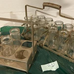 Photo of Lot of Vintage Embossed Urine Specimen Bottles and Metal Carriers