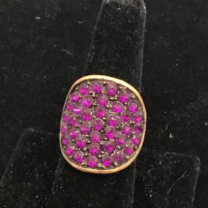Photo of Bronze toned ring with purple rhinestones