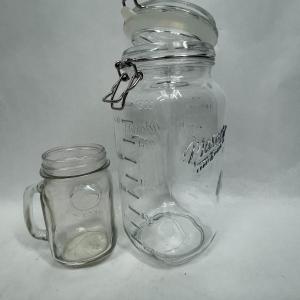 Photo of Large Mason Glass Jar with. hinged lid and small Ball jar