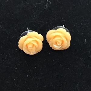 Photo of Peach colored flower earrings