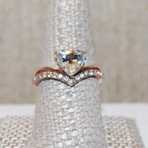 Photo of Size 9½ Clear Single Heart Shaped Stone Ring with Row of Accent Stones on a Sil
