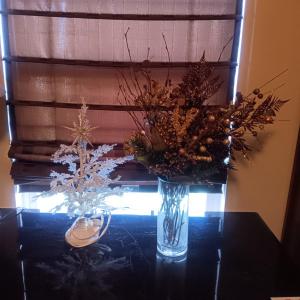 Photo of SMALL LIGHTED CHRISTMAS TREE AND A VASE W//FAUX FOLIAGE