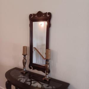 Photo of WALL MIRROR WITH A PAIR OF CANDLESTICKS & FLAMELESS CANDLES