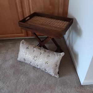 Photo of FOLDING CANED SERVING SIDE TABLE WITH A TAHARI THROW PILLOW